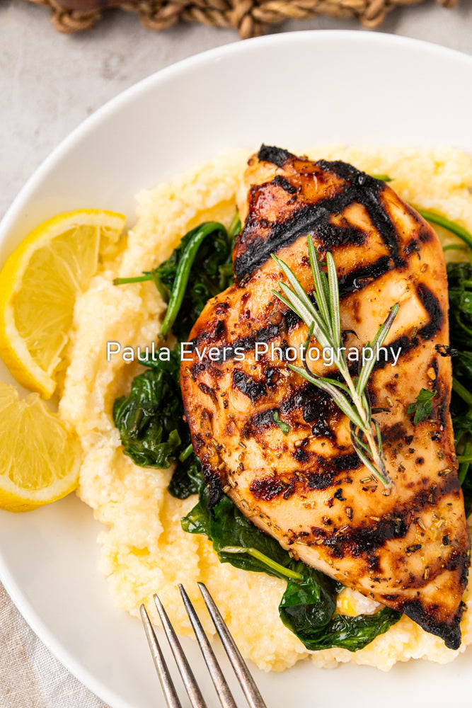Grilled Rosemary Chicken over Grits and Spinach