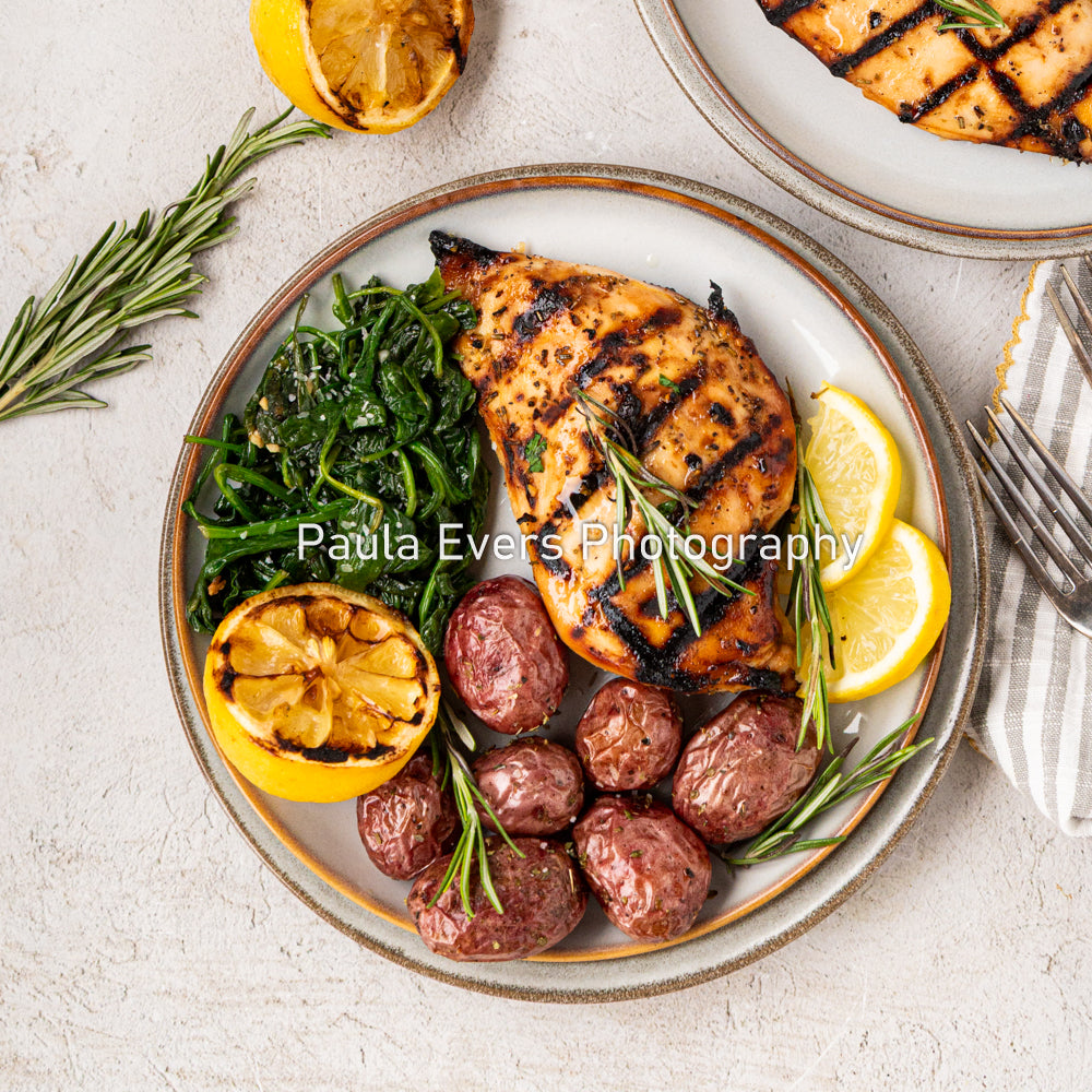Grilled Rosemary Chicken over Grits and Spinach