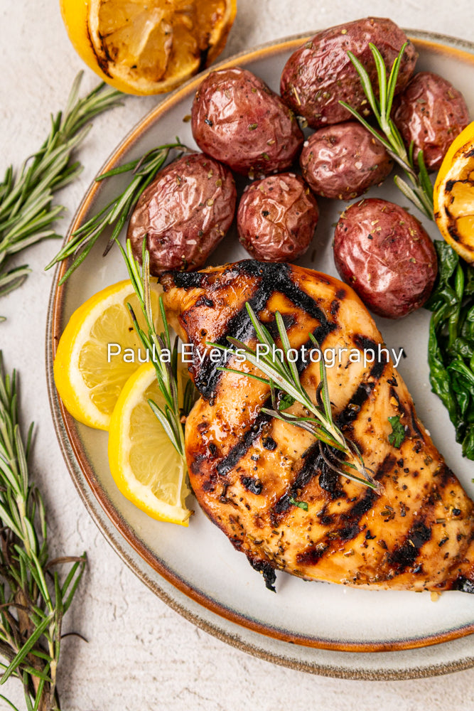 Grilled Rosemary Chicken over Grits and Spinach