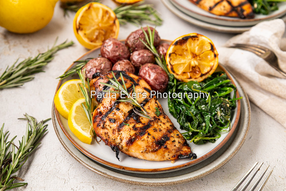 Grilled Rosemary Chicken over Grits and Spinach